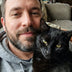 A cat owner with their cat